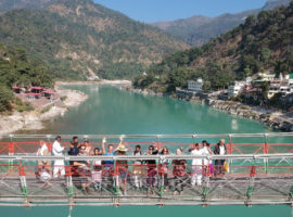 Drone View Of Students Crossing Iconic Ram Jhoola Bridge – IYMS Rishikesh