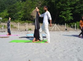 Hatha Yoga Session on Bank of River Ganga – IYMS Rishikesh