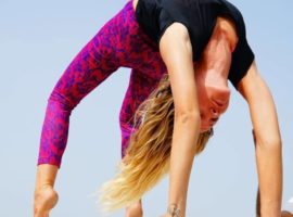 Student Posing Wheel Pose – IYMS Rishikesh